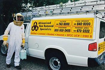 Litchfield Park bee removal service truck and employee